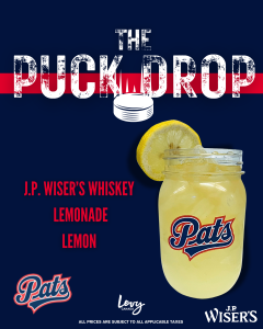 Pats lemonade with whiskey and lemon garnish
