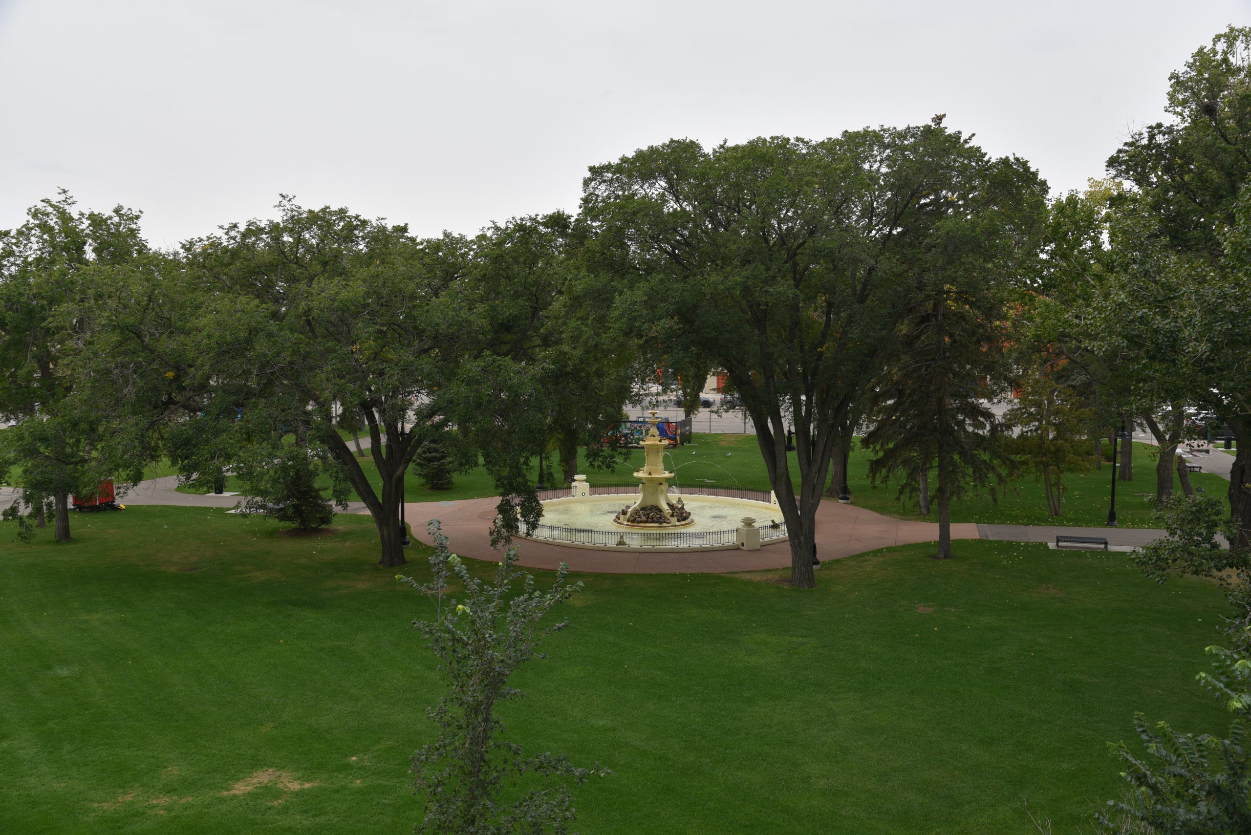 Fountain surrounded by trees in a park