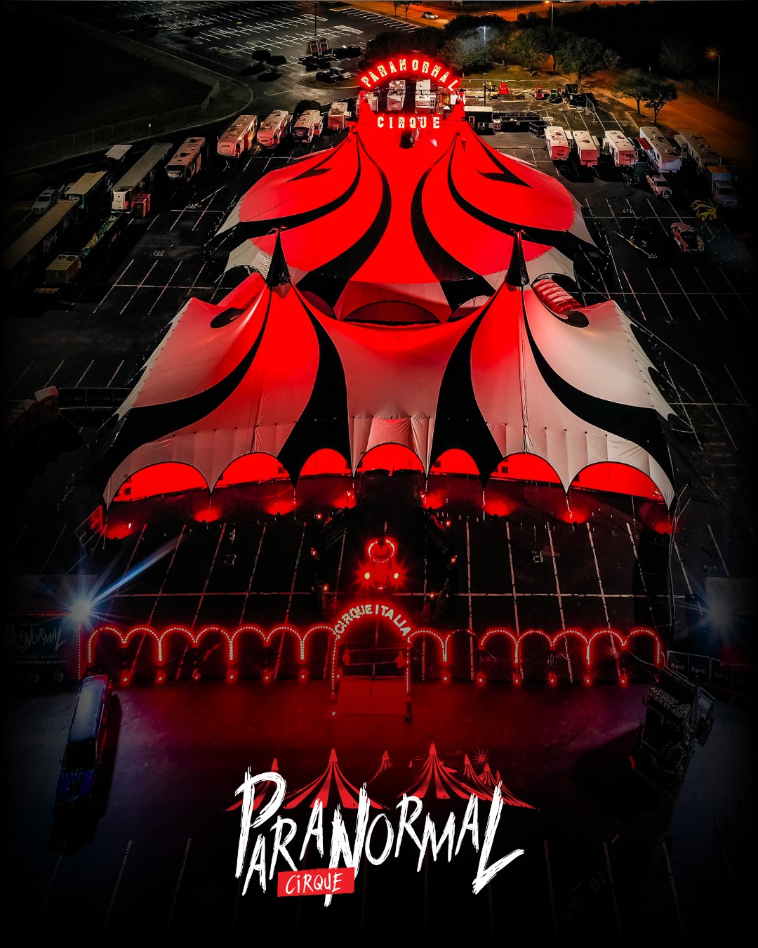 Red and black circus tent at night