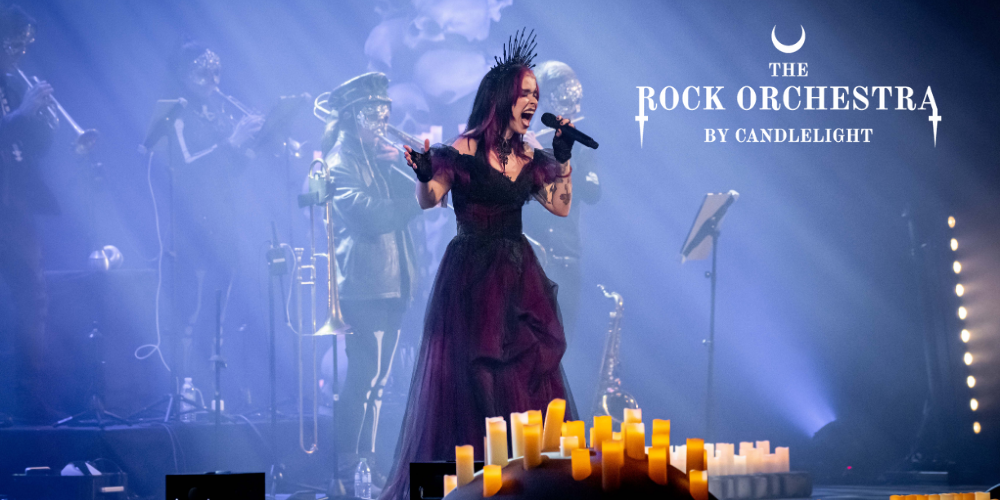 Rock orchestra performing live by candlelight.